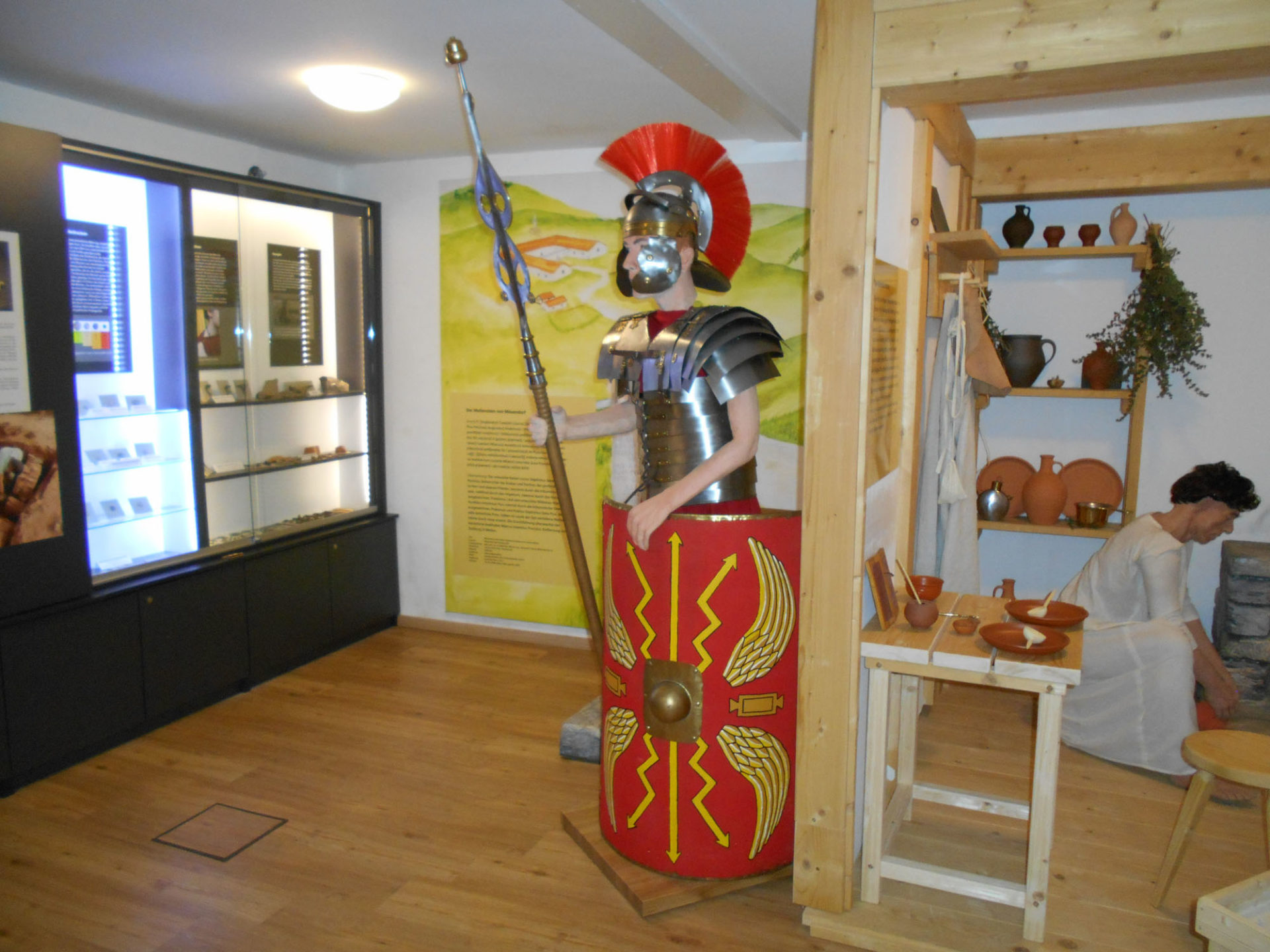 Ausstellung von alten Ritterrüstungen und ursprünglichen Lebensformen